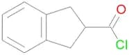 2,3-Dihydro-1H-indene-2-carbonyl chloride