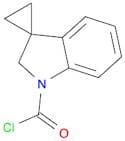 Spiro[cyclopropane-1,3'-[3H]indole]-1'(2'H)-carbonyl chloride