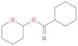 Cyclohexanecarboxylic acid, tetrahydro-2H-pyran-2-yl ester