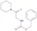 Carbamic acid, [2-(1-piperidinyl)-2-thioxoethyl]-, phenylmethyl ester
