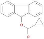 9H-Fluoren-9-yl cyclopropanecarboxylate