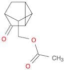 Tricyclo[2.2.1.02,6]heptanone, 5-[(acetyloxy)methyl]- (9CI)