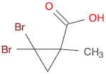 2,2-Dibromo-1-methylcyclopropanecarboxylic acid