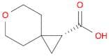 (1R)-6-oxaspiro[2.5]octane-1-carboxylic acid