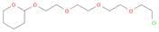 2H-Pyran, 2-[2-[2-[2-(2-chloroethoxy)ethoxy]ethoxy]ethoxy]tetrahydro-
