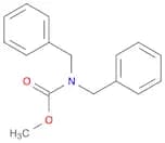 Carbamic acid, bis(phenylmethyl)-, methyl ester (9CI)