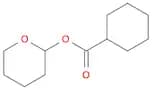 Cyclohexanecarboxylic acid, tetrahydro-2H-pyran-2-yl ester