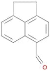 1,2-dihydroacenaphthylene-5-carbaldehyde