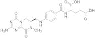 (S)-N-[4-[[((R)-2-Amino-6,7,8,9-tetrahydro-8-methyl-4,9-dioxo-4H-pyrazino[1,2-a]-1,3,5-triazin-7-y…