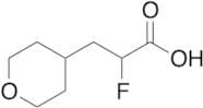 2-Fluoro-3-(oxan-4-yl)propanoic acid