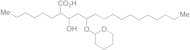 2-Hexyl-3-hydroxy-5-[(tetrahydro-2H-pyran-2-yl)oxy]-hexadecanoic Acid