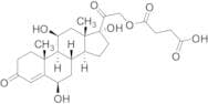 (6β,​11β)​-​6,​11,​17-​Trihydroxy-21-​(3-​carboxy-​1-​oxopropoxy)-​pregn-​4-​ene-​3,​20-​dione