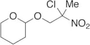 2-(2-Chloro-2-nitropropoxy)tetrahydro-2H-pyran