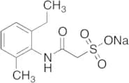 Sodium 2-((2-Ethyl-6-methylphenyl)amino)-2-oxoethanesulfonate